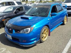 BUY SUBARU IMPREZA SEDAN 2006 2.5 WRX STI W/GOLD WHEELS, WSM Auctions
